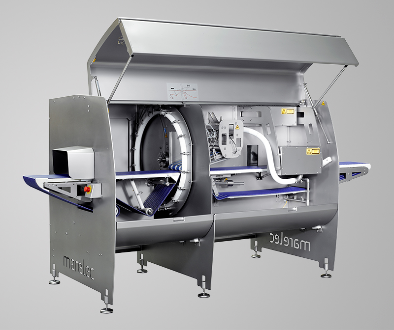 Intelligent cutting machine for fixed-weight portions of poultry products such as large poultry fillets for turkey fillets.